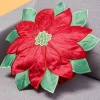 Coussin rond fleur poinsettia