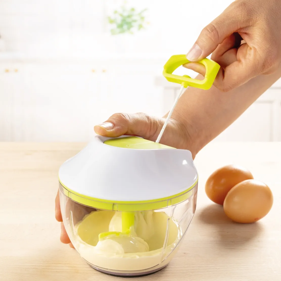 Hachoir/batteur manuel