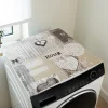 Tapis protège lave-linge cœur